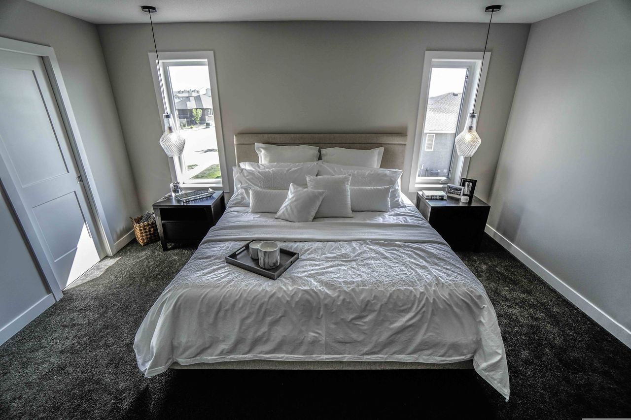 Original bedroom photo with dim corners and blown-out windows
